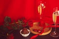 Valentines day background. Red roses, champagne glasess, chocolate candies - romantic traditional dinner Royalty Free Stock Photo