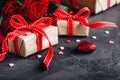 Valentines day background with red roses, present box Royalty Free Stock Photo