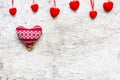 Valentines day background with red velvet hearts and knitted heart Royalty Free Stock Photo