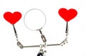 Valentines Day background with tool third hand holding hearts on white