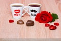 Valentines Day background with two coffee cups and rose flower Royalty Free Stock Photo