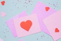 Valentines day background. Valentine card with heart and craft paper on the blue background