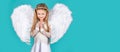Valentines day banner with angel child. Child with angelic face. Cute child girl posing with angel wings.