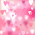 Valentines day blurred love background with pink hearts. Abstract romantic design with defocused light