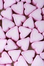 Valentines Day candy hearts marshmallows over green background Royalty Free Stock Photo
