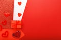 Valentines day card with copy space frame. Red background with hearts present gift ribbon. Concept of Valentine Day Love Romance Royalty Free Stock Photo