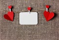 Valentines day card with hearts on a sacking or hessian or burlap background Royalty Free Stock Photo