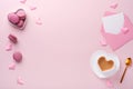 Valentines Day card. Pink empty envelope, macaron macaroon cookie and heart shaped coffee cup on pink background. 8 March, Womens