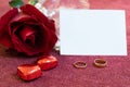 valentines day card rose golden rings and chocolates Royalty Free Stock Photo