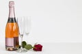Valentines Day champagne bottle, flutes and rose Royalty Free Stock Photo