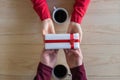 Valentines day.  Close-up of woman and man celebrating in restaurant. Boyfriend giving small box gift to girlfriend. love, romance Royalty Free Stock Photo