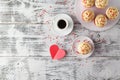 Valentines day coffee cup with cupcakes with hearts