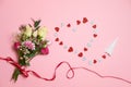 Valentines day composition : bouquet of flowers with ribbon bow, heart heart shape made of valentines cards and paper airplane. lo Royalty Free Stock Photo