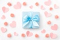 Valentines day composition. Love Day floral background with coral or pink flowers rose, coral hearts, gift box flat lay. Royalty Free Stock Photo