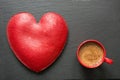 Valentines day composition with red coffee cup and big heart of red velvet cake over slate plate. Top view. Copy space. Royalty Free Stock Photo