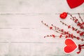 Valentines Day composition. Red hearts, gift box, on wooden background. Royalty Free Stock Photo