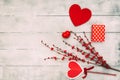 Valentines Day composition. Red hearts, gift box, on wooden background. Love or romantic concept. Flat lay