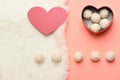 Valentines day concept. Heart shaped box with coconut balls Royalty Free Stock Photo