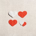 Valentines day concept, knit hearts valentine as creative square pattern, handmade colored crochet heart on cloth table