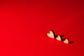 Valentines day concept. Love concept. Celebrating valentine`s day with hearts.  Close up of hearts on a red background Royalty Free Stock Photo