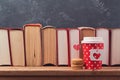 Valentines day concept with paper coffee cup, macarons and vintage books Royalty Free Stock Photo