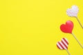 Valentines day concept. Red hearts on yellow background. Copy space Royalty Free Stock Photo