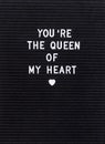 The words You`re The Queen Of My Heart on black felt letter board Royalty Free Stock Photo