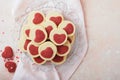 Valentines day cookies. Shortbread cookies inside a sweet red heart on pink plate on pink background. Mothers day. Womans day. Swe Royalty Free Stock Photo