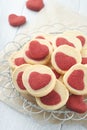 Valentines day cookies. Shortbread cookies inside a sweet red heart on parchment paper on white background. Mothers day. Womans da Royalty Free Stock Photo