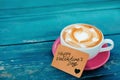 Valentines Day or Customer Care and Service Concept. The Barista Served a Hot Coffee Latte Cup with Note Royalty Free Stock Photo