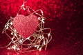 Valentines day dark red Red heart with light background.Sparkling glittering maroon,burgundy black color night light elegance,smoo