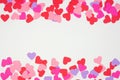 Valentines Day double border with paper heart confetti view over a white background Royalty Free Stock Photo