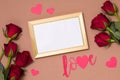 Valentines day,empty frame,love,nude background,gift,red roses,hearts,message,free copy text space Royalty Free Stock Photo