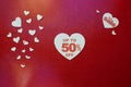 Valentines day of fifty percent sale in big white heart in the center on red background. Royalty Free Stock Photo