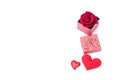 Valentines day gift boxes, rose and paper hearts isolated
