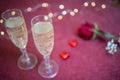 valentines day glasses of champagne close up and lights Royalty Free Stock Photo