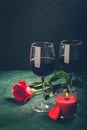 Valentines day greeting card concept. Wine glasses, rose and can