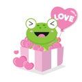 Valentines day greeting card.Cute frog holding pink ballon and sit in the gift box Royalty Free Stock Photo