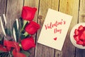 Valentines day greeting card, gift box and red roses Royalty Free Stock Photo