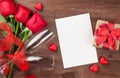 Valentines day greeting card, gift box and red roses Royalty Free Stock Photo