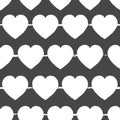 Valentines Day grey and white background. Vector seamless pattern with white hearts on grey background. Royalty Free Stock Photo