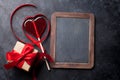 Valentines day. Heart shaped red ribbon and gift Royalty Free Stock Photo