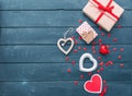Open heart shape gift box with cookies over wooden background. Royalty Free Stock Photo