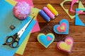 Valentines day hearts ornaments. Colorful felt heart ornaments, scissors, thread set, pincushion, needles, thimble, felt sheets