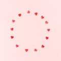 Valentines day love concept. Frame of red hearts on pink background. Royalty Free Stock Photo