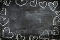 Valentines Day, love illustration with chalk drawing hearts shapes on the blackboard and a copy space for your text or