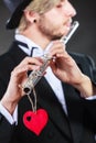 Male flutist with flute and heart. Love melody Royalty Free Stock Photo