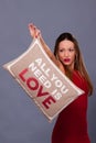 Valentines Day message with pillow all you need is love Royalty Free Stock Photo