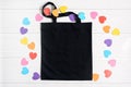 Valentines day mockup tote bag with paper colorful hearts.