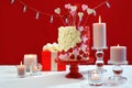 Valentines Day party table with showstopper hearts cake. Royalty Free Stock Photo